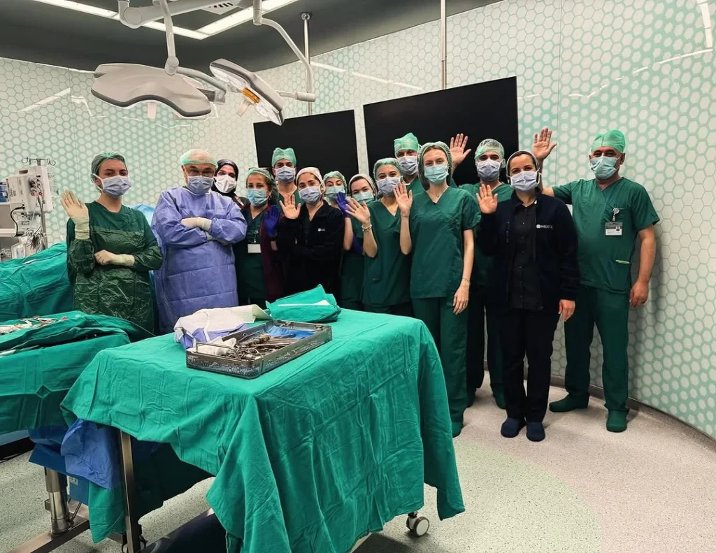 Assoc. Prof. Ali Zirh from inside the operating room with his surgical team